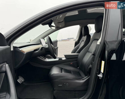Черный Тесла Model Y, объемом двигателя 0 л и пробегом 22 тыс. км за 27999 $, фото 21 на Automoto.ua