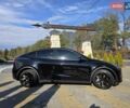 Черный Тесла Model Y, объемом двигателя 0 л и пробегом 27 тыс. км за 28999 $, фото 4 на Automoto.ua