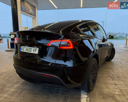 Черный Тесла Model Y, объемом двигателя 0 л и пробегом 53 тыс. км за 34999 $, фото 4 на Automoto.ua
