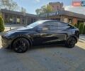 Черный Тесла Model Y, объемом двигателя 0 л и пробегом 27 тыс. км за 28999 $, фото 1 на Automoto.ua