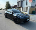 Черный Тесла Model Y, объемом двигателя 0 л и пробегом 79 тыс. км за 31999 $, фото 51 на Automoto.ua