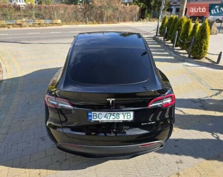 Черный Тесла Model Y, объемом двигателя 0 л и пробегом 27 тыс. км за 28999 $, фото 2 на Automoto.ua