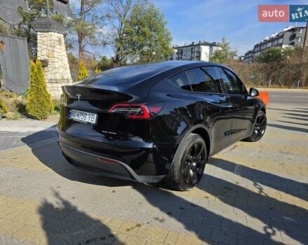 Черный Тесла Model Y, объемом двигателя 0 л и пробегом 27 тыс. км за 28999 $, фото 3 на Automoto.ua