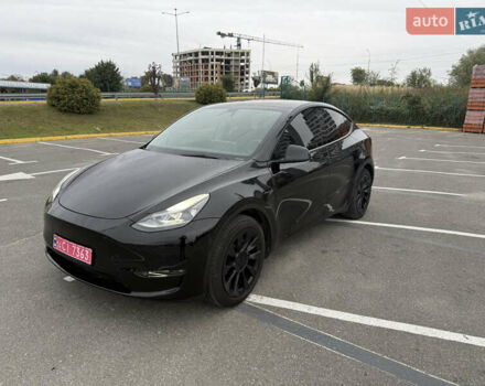 Черный Тесла Model Y, объемом двигателя 0 л и пробегом 65 тыс. км за 27000 $, фото 1 на Automoto.ua