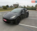 Черный Тесла Model Y, объемом двигателя 0 л и пробегом 65 тыс. км за 27000 $, фото 1 на Automoto.ua