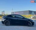 Черный Тесла Model Y, объемом двигателя 0 л и пробегом 73 тыс. км за 27890 $, фото 4 на Automoto.ua