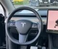 Черный Тесла Model Y, объемом двигателя 0 л и пробегом 73 тыс. км за 27890 $, фото 28 на Automoto.ua
