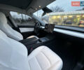 Черный Тесла Model Y, объемом двигателя 0 л и пробегом 85 тыс. км за 28000 $, фото 39 на Automoto.ua