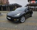 Черный Тесла Model Y, объемом двигателя 0 л и пробегом 24 тыс. км за 29999 $, фото 1 на Automoto.ua