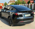 Черный Тесла Model Y, объемом двигателя 0 л и пробегом 79 тыс. км за 31999 $, фото 65 на Automoto.ua