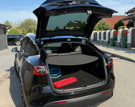 Черный Тесла Model Y, объемом двигателя 0 л и пробегом 79 тыс. км за 31999 $, фото 48 на Automoto.ua