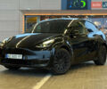 Черный Тесла Model Y, объемом двигателя 0 л и пробегом 53 тыс. км за 34999 $, фото 1 на Automoto.ua