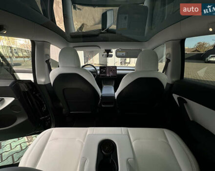 Черный Тесла Model Y, объемом двигателя 0 л и пробегом 136 тыс. км за 26199 $, фото 49 на Automoto.ua