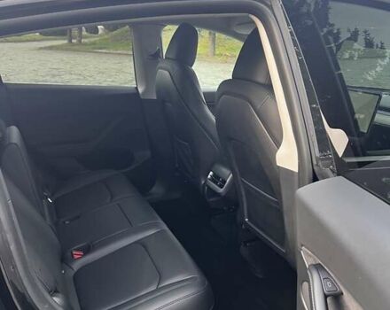 Черный Тесла Model Y, объемом двигателя 0 л и пробегом 64 тыс. км за 29100 $, фото 7 на Automoto.ua