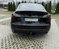 Черный Тесла Model Y, объемом двигателя 0 л и пробегом 80 тыс. км за 28000 $, фото 1 на Automoto.ua