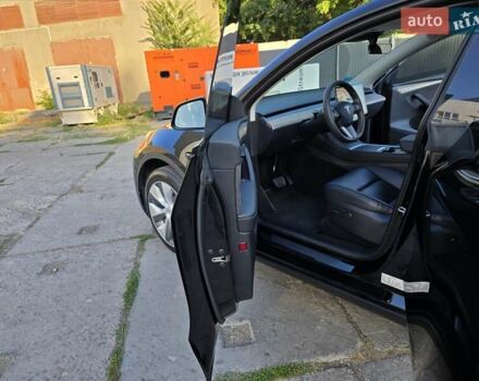Чорний Тесла Model Y, об'ємом двигуна 0 л та пробігом 95 тис. км за 27300 $, фото 30 на Automoto.ua