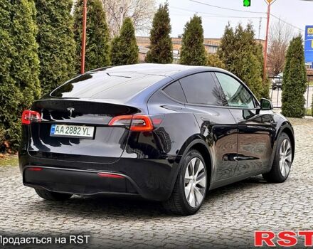 Чорний Тесла Model Y, об'ємом двигуна 0 л та пробігом 99 тис. км за 22999 $, фото 2 на Automoto.ua