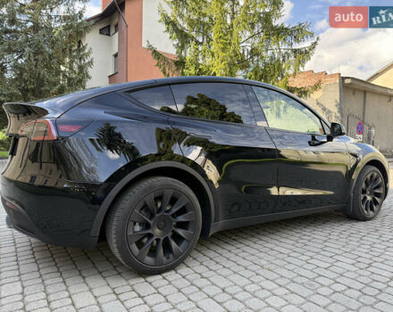 Черный Тесла Model Y, объемом двигателя 0 л и пробегом 58 тыс. км за 27500 $, фото 2 на Automoto.ua