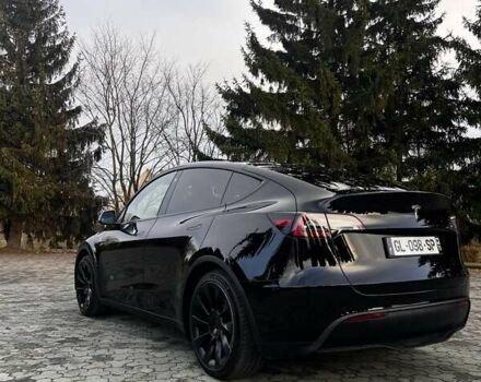 Черный Тесла Model Y, объемом двигателя 0 л и пробегом 64 тыс. км за 29100 $, фото 2 на Automoto.ua