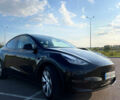 Черный Тесла Model Y, объемом двигателя 0 л и пробегом 22 тыс. км за 25500 $, фото 1 на Automoto.ua