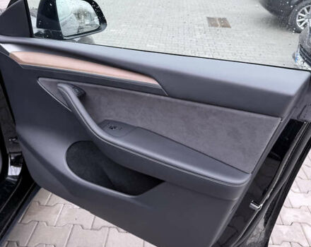 Черный Тесла Model Y, объемом двигателя 0 л и пробегом 84 тыс. км за 25900 $, фото 36 на Automoto.ua