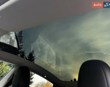 Черный Тесла Model Y, объемом двигателя 0 л и пробегом 64 тыс. км за 29100 $, фото 16 на Automoto.ua