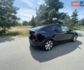 Черный Тесла Model Y, объемом двигателя 0 л и пробегом 6 тыс. км за 34000 $, фото 1 на Automoto.ua