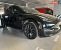 Черный Тесла Model Y, объемом двигателя 0 л и пробегом 26 тыс. км за 29300 $, фото 1 на Automoto.ua