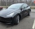 Черный Тесла Model Y, объемом двигателя 0 л и пробегом 49 тыс. км за 28900 $, фото 1 на Automoto.ua