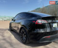 Черный Тесла Model Y, объемом двигателя 0 л и пробегом 28 тыс. км за 29499 $, фото 4 на Automoto.ua