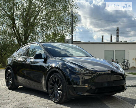 Черный Тесла Model Y, объемом двигателя 0 л и пробегом 2 тыс. км за 40990 $, фото 19 на Automoto.ua