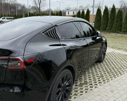 Черный Тесла Model Y, объемом двигателя 0 л и пробегом 80 тыс. км за 28000 $, фото 2 на Automoto.ua