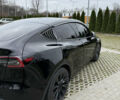 Черный Тесла Model Y, объемом двигателя 0 л и пробегом 80 тыс. км за 28000 $, фото 2 на Automoto.ua