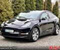 Черный Тесла Model Y, объемом двигателя 0 л и пробегом 99 тыс. км за 22999 $, фото 1 на Automoto.ua