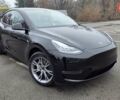 Черный Тесла Model Y, объемом двигателя 0 л и пробегом 49 тыс. км за 28900 $, фото 1 на Automoto.ua