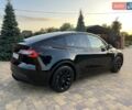 Черный Тесла Model Y, объемом двигателя 0 л и пробегом 24 тыс. км за 30999 $, фото 1 на Automoto.ua