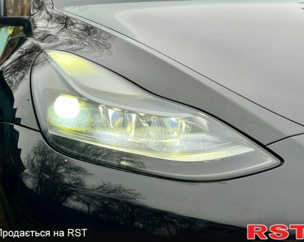 Черный Тесла Model Y, объемом двигателя 0.39 л и пробегом 71 тыс. км за 24400 $, фото 4 на Automoto.ua