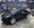 Черный Тесла Model Y, объемом двигателя 0 л и пробегом 80 тыс. км за 28000 $, фото 1 на Automoto.ua