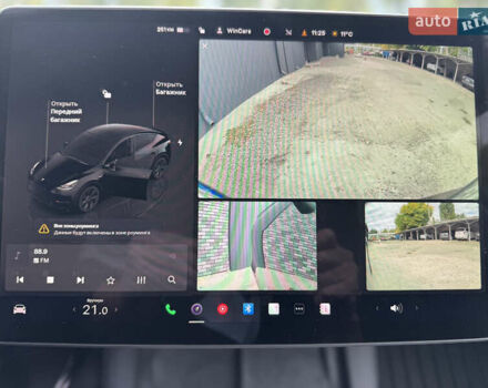 Черный Тесла Model Y, объемом двигателя 0 л и пробегом 2 тыс. км за 38300 $, фото 41 на Automoto.ua