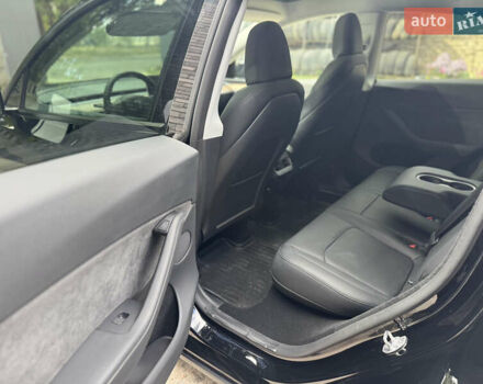 Черный Тесла Model Y, объемом двигателя 0 л и пробегом 2 тыс. км за 38300 $, фото 29 на Automoto.ua