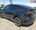 Черный Тесла Model Y, объемом двигателя 0 л и пробегом 3 тыс. км за 23000 $, фото 1 на Automoto.ua