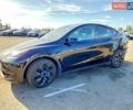 Черный Тесла Model Y, объемом двигателя 0 л и пробегом 84 тыс. км за 22170 $, фото 1 на Automoto.ua