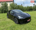Черный Тесла Model Y, объемом двигателя 0 л и пробегом 15 тыс. км за 27998 $, фото 1 на Automoto.ua