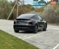 Черный Тесла Model Y, объемом двигателя 0 л и пробегом 14 тыс. км за 27500 $, фото 45 на Automoto.ua
