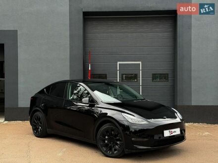 Черный Тесла Model Y, объемом двигателя 0 л и пробегом 99 тыс. км за 23999 $, фото 1 на Automoto.ua