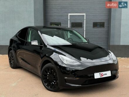 Черный Тесла Model Y, объемом двигателя 0 л и пробегом 66 тыс. км за 25999 $, фото 1 на Automoto.ua