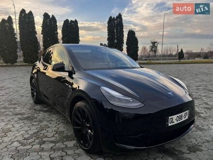 Черный Тесла Model Y, объемом двигателя 0 л и пробегом 64 тыс. км за 24500 $, фото 1 на Automoto.ua