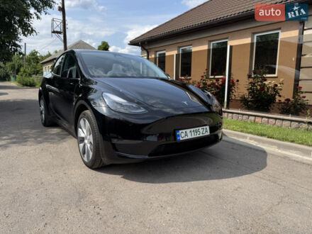 Черный Тесла Model Y, объемом двигателя 0 л и пробегом 28 тыс. км за 29900 $, фото 1 на Automoto.ua