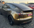 Коричневый Тесла Model Y, объемом двигателя 0 л и пробегом 84 тыс. км за 24990 $, фото 7 на Automoto.ua