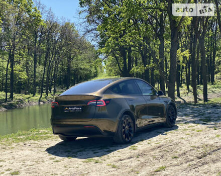 Коричневый Тесла Model Y, объемом двигателя 0 л и пробегом 66 тыс. км за 29999 $, фото 4 на Automoto.ua